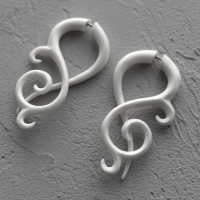 Резная серьга-обманка из кости